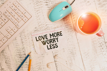 Conceptual hand writing showing Love More Worry Less. Concept meaning Have a good attitude...