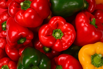 Fresh red, green, yellow bell pepper background.