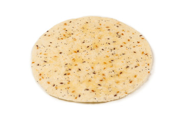 Pitta bread with seeds isolated on white