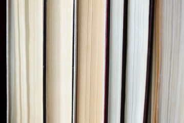 A stack of old books close-up. Educational background