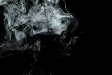 Obraz premium Abstract powder or smoke effect isolated on black background
