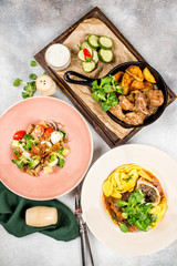 Three dishes from the menu for the restaurant