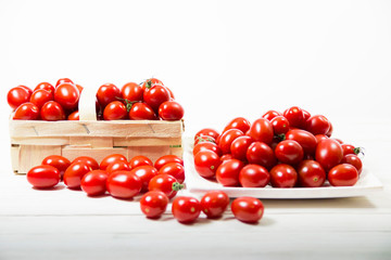 chery tomatoes on wooden board