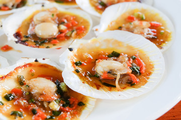Grilled scallops shell with butter and garlic