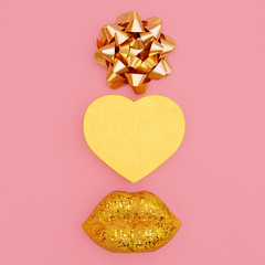 Golden lips and gift box heart. Valentines day concept