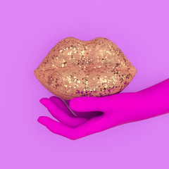 Fake hand and lips. Minimal art. Kiss make-up concept