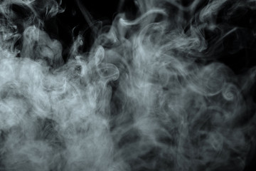 Abstract powder or smoke effect isolated on black background