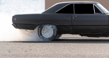 Racecar burning rubber