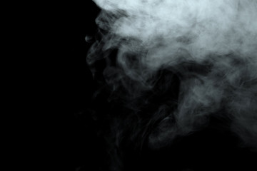 Abstract powder or smoke effect isolated on black background