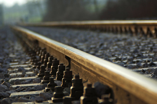 railway track concept: close-up view of traditional train rails