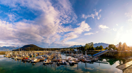 Fototapeta na wymiar Panorama of Harbor with Boats 