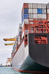 Container cargo ship in Maritime port  and Container Harbor. Transportation industry and shipping...
