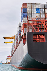 Container cargo ship in Maritime port  and Container Harbor. Transportation industry and shipping...