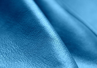 Fototapeta premium Genuine Leather. Blue background. Genuine leather texture.