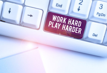 Text sign showing Work Hard Play Harder. Business photo text a Balance Life Have a Break Destressing to Relax White pc keyboard with empty note paper above white background key copy space