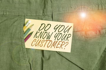 Writing note showing Do You Know Your Customer Question. Business concept for service identify clients with relevant information Writing equipment and yellow note paper inside pocket of man trousers