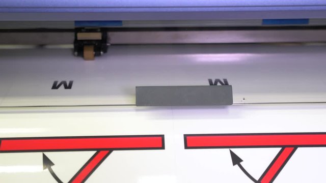 Wide-format inkjet printer in action 