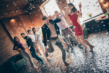Full length photo of friends gathering dance floor x-mas students party amazing mood dancing youth moves glitter air wear formalwear dress shirts jacket luxury restaurant indoors