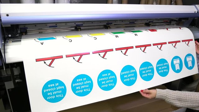 Wide-format inkjet printer in action 