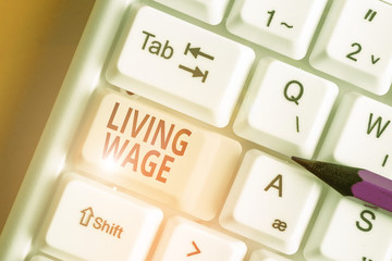 Word writing text Living Wage. Business photo showcasing wage that is high enough to maintain a...