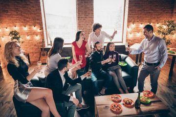 Fototapeta premium Photo of festive group birthday occasion party people listening greeting toast clinking glasses drink golden wine eating snacks wear formalwear restaurant indoors
