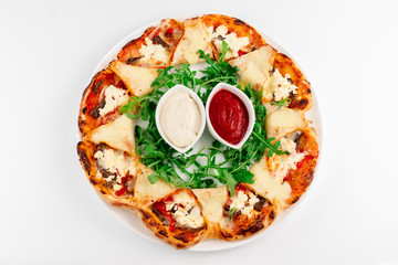 pizza with ham cheese tomatoes and olives