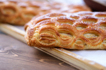 Fresh buns in bakery shop