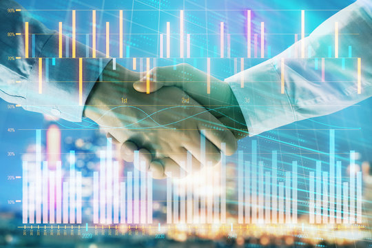 Double exposure of financial chart on cityscape background with two businessmen handshake. Concept of financial analysis and investment opportunities © Andrey