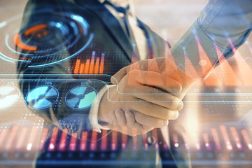 Double exposure of business theme drawing on cityscape background with handshake. Concept of...