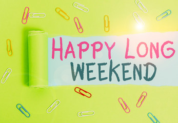 Writing note showing Happy Long Weekend. Business concept for wishing someone happy vacation Travel to holiday Paper clip and torn cardboard on wood classic table backdrop