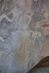 Detail of a part of the petroglyphs incised by the Fremont People in the sandstone rock face at Dinosaur National Monument, Utah