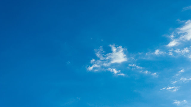 White clouds blue sky background. 