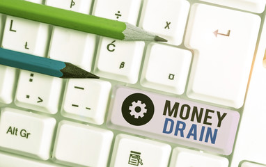 Writing note showing Money Drain. Business concept for To waste or squander money Spend money...