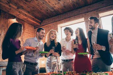 Portrait of nice attractive smart cheerful colleagues celebrating enjoying spending thanks giving day harvest tradition autumn fall at modern industrial brick wood loft style interior office house