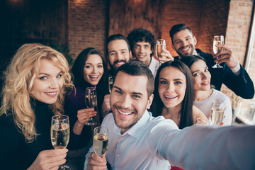 Self-portrait of nice-looking attractive lovely trendy charming cheerful cheery glad people company meeting celebrating festal day at modern industrial brick loft style interior house indoors
