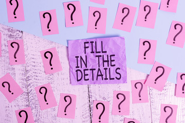 Text sign showing Fill In The Details. Business photo showcasing Add Information in an Empty Space in a Document Scribbled and crumbling papers with thick cardboard above wooden table