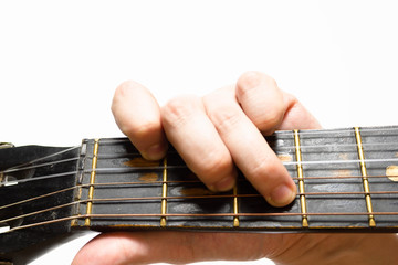 finger chords acoustic guitar on white background