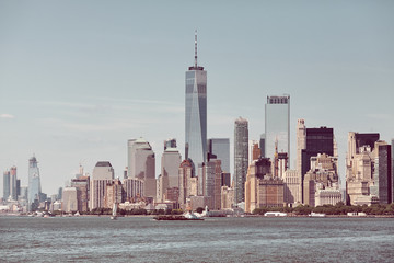 New York City skyline on a sunny day, retro color toning applied, USA.