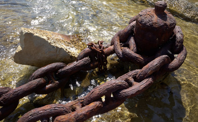 Heavy Rusty Shipping Anchor Chain on the seashore of Manoel Island Malta