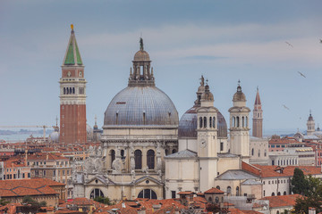 Aerial panorama of Basilica della Salute domes and San Marco bell tower, Venice, Italy