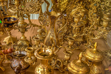 Fototapeta na wymiar Old beautiful copper utensils. Eastern market