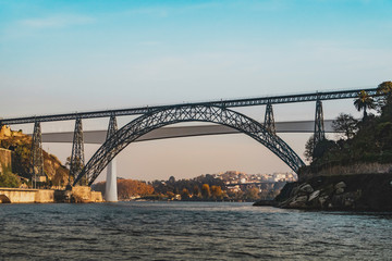 View from Douro River to Maria Pia Bridge and Infante Dom Henrique Bridge