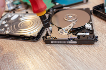 old broken hard disk drives repair recovery service concept close up selective focus