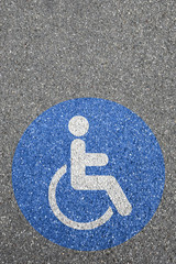 Man people wheelchair road sign disabled copyspace copy space handicapped wheel chair street