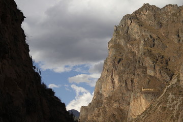 A Mayan building built in a valley in the mountains of the Sacred Valley of Cusco. Peru