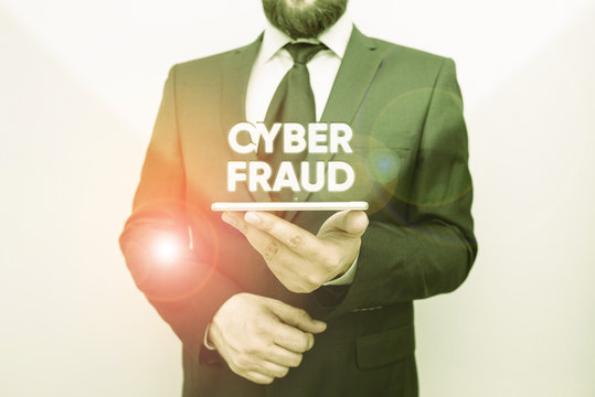 Word writing text Cyber Fraud. Business photo showcasing any crime that is committed with the use of a computer Male human wear formal work suit hold smart hi tech smartphone use one hand