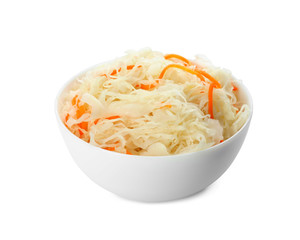 Bowl of tasty fermented cabbage isolated on white