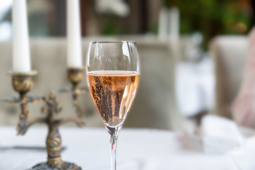 Glass of rose sparkling wine. Pastel hues.