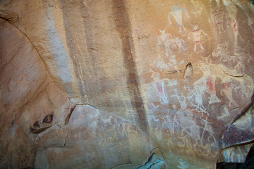 Detail of a part of the petroglyphs incised by the Fremont People in the sandstone rock face at Dinosaur National Monument, Utah