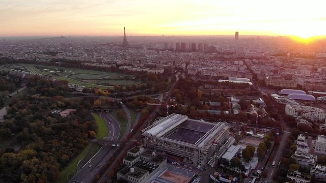 Aerial view of Paris skyline with Eiffel Tower from the Boulogne Forest at rising morning sun